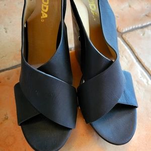 Black faux leather studded cross wedges